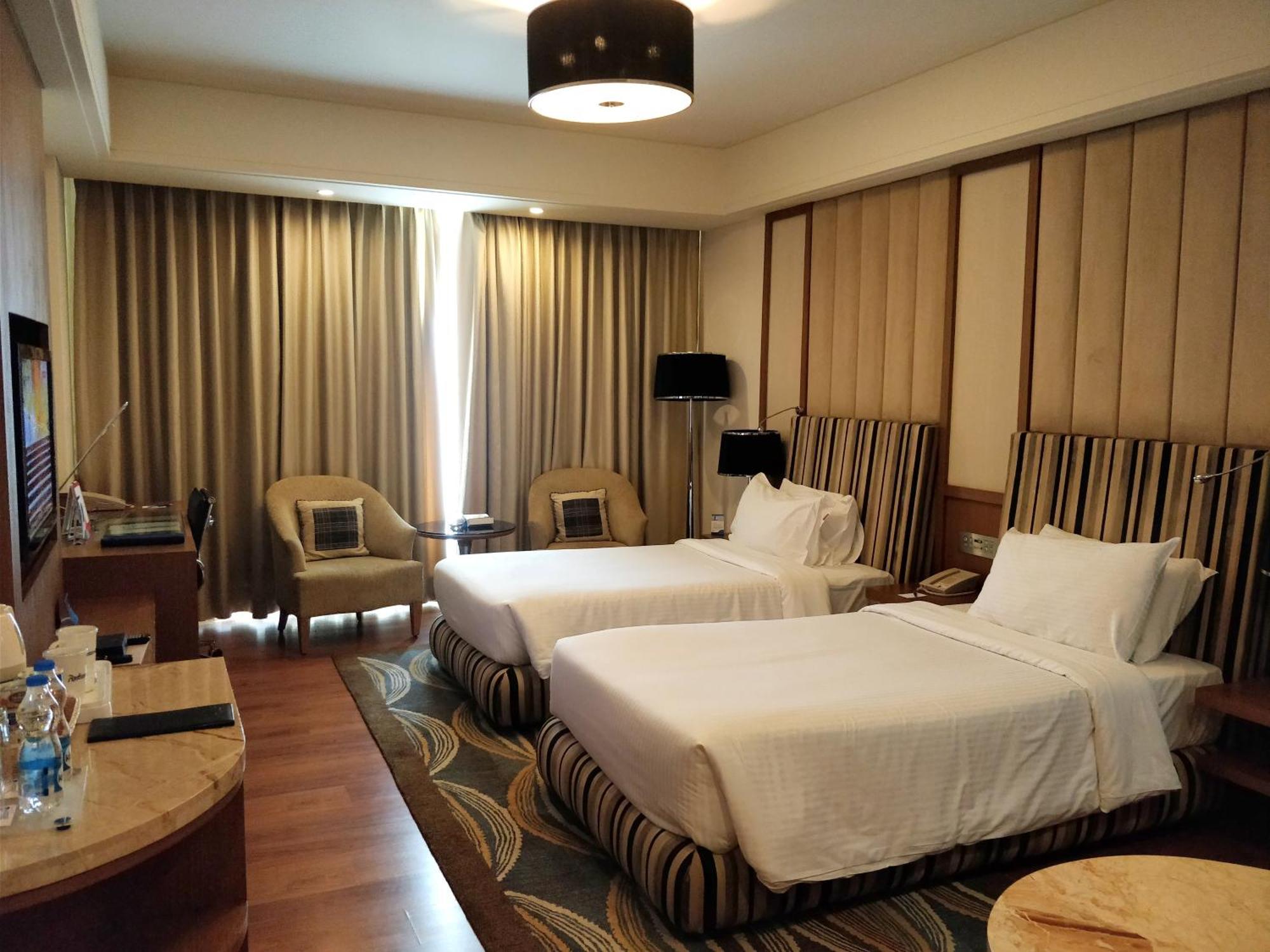 Deluxe Twin or King Room Airport transfer Complimentary 11 Happy Hours from 6pm to 8pm on Food & Beverage Services Laundry Services Spa,1443720493:JPEG