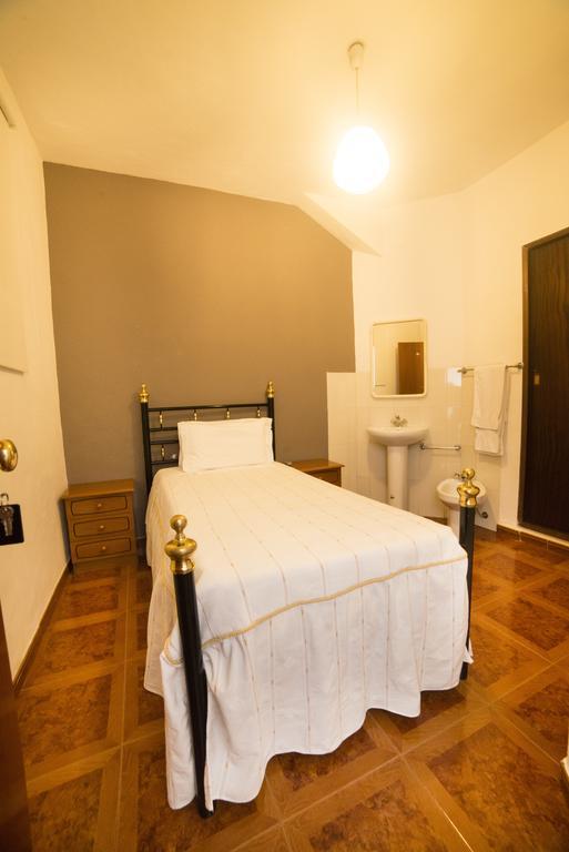 Habitación Individual con baño compartido