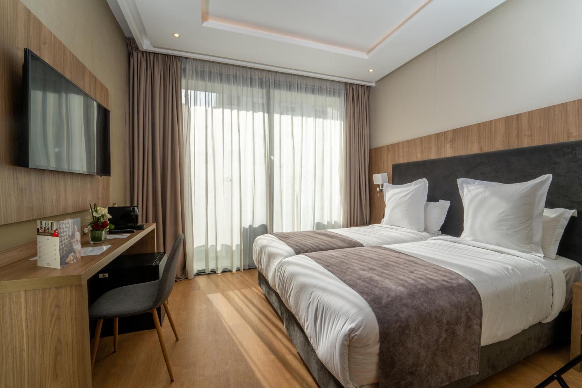 Luxe Kamer met 1 of 2 Bedden en Balkon