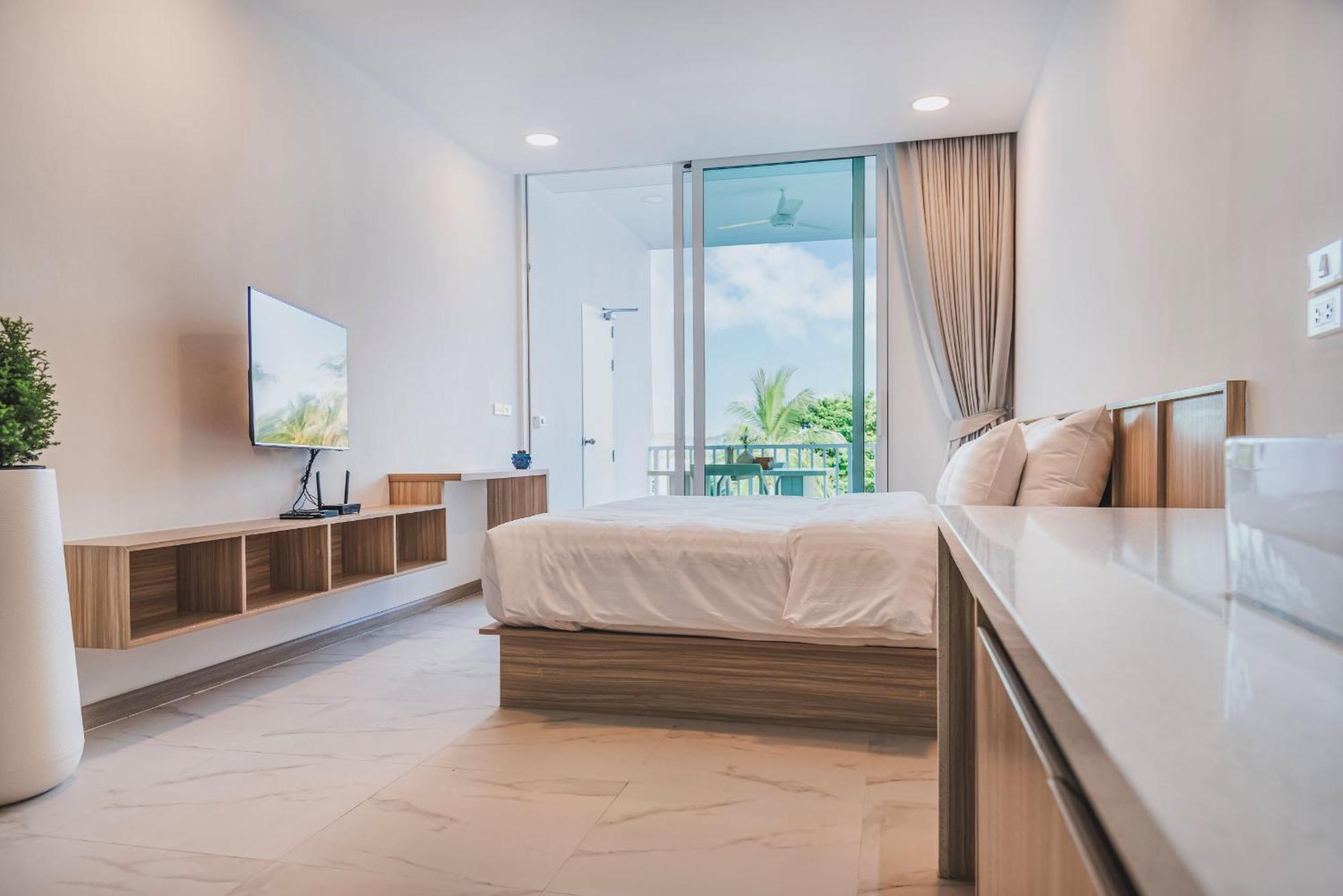 Chambre Lit Queen-Size - Vue sur Mer