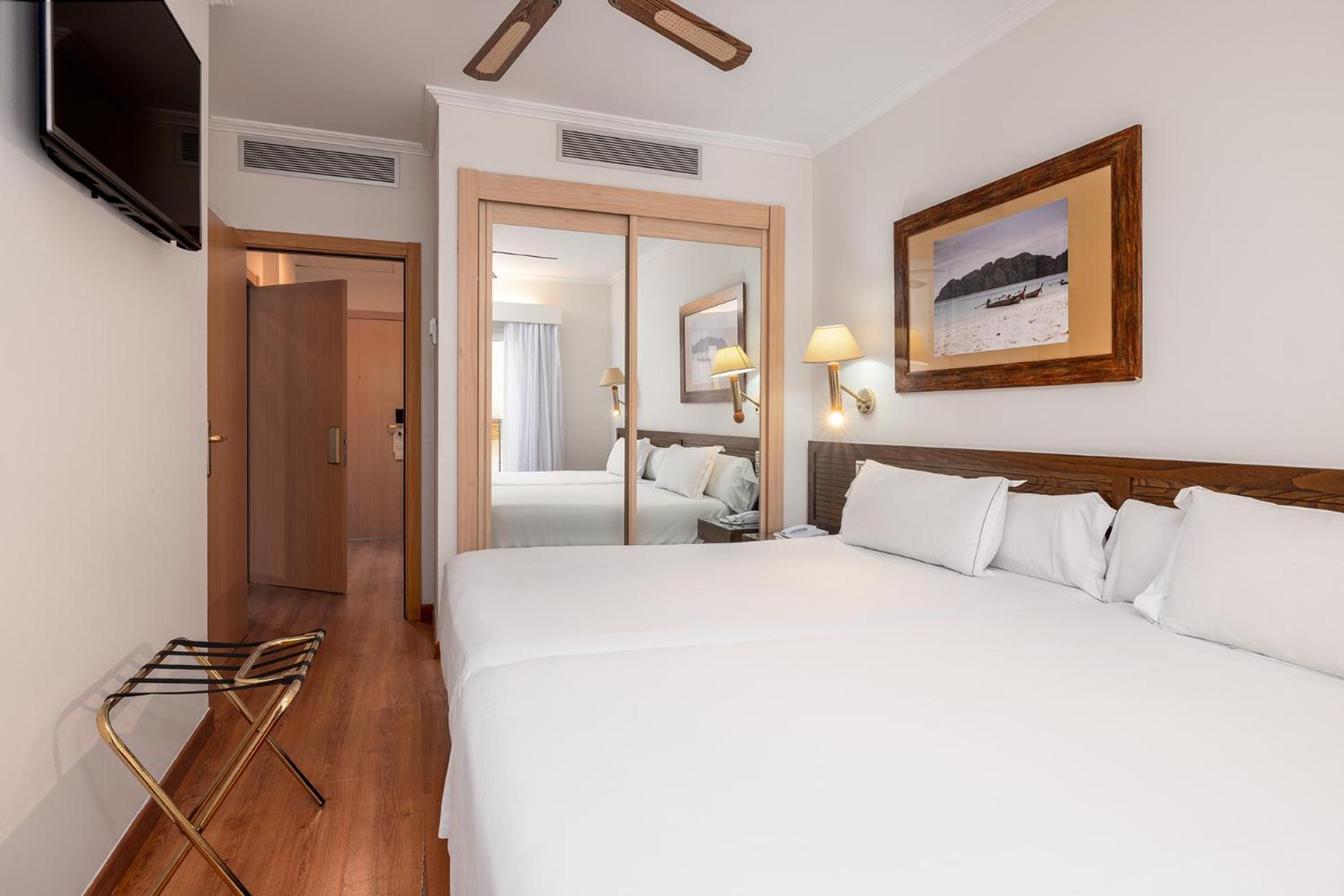 Two Connecting Double Rooms (3 Adults + 1 Child)