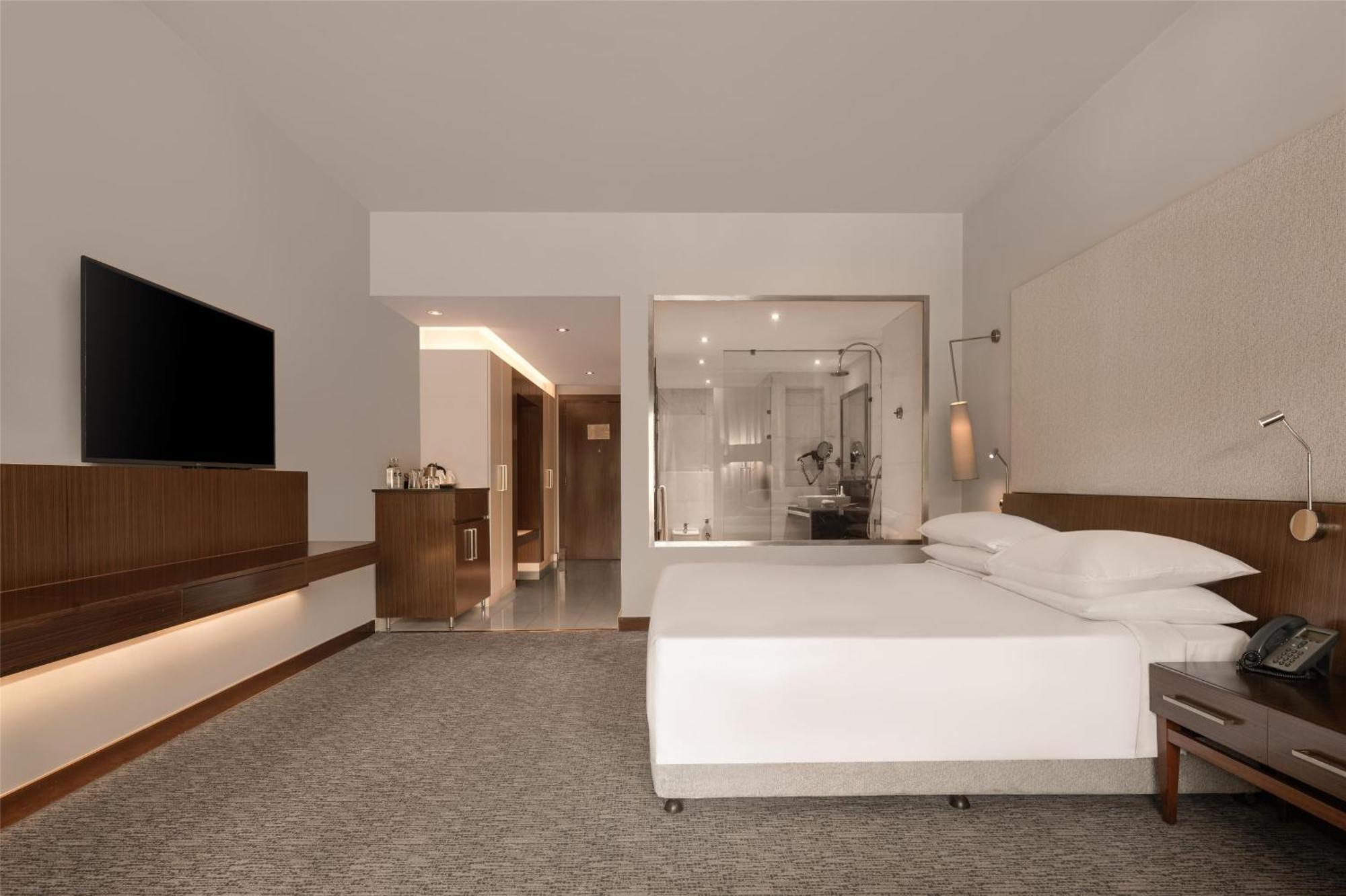 Chambre de Luxe - Accès Direct à la Piscine