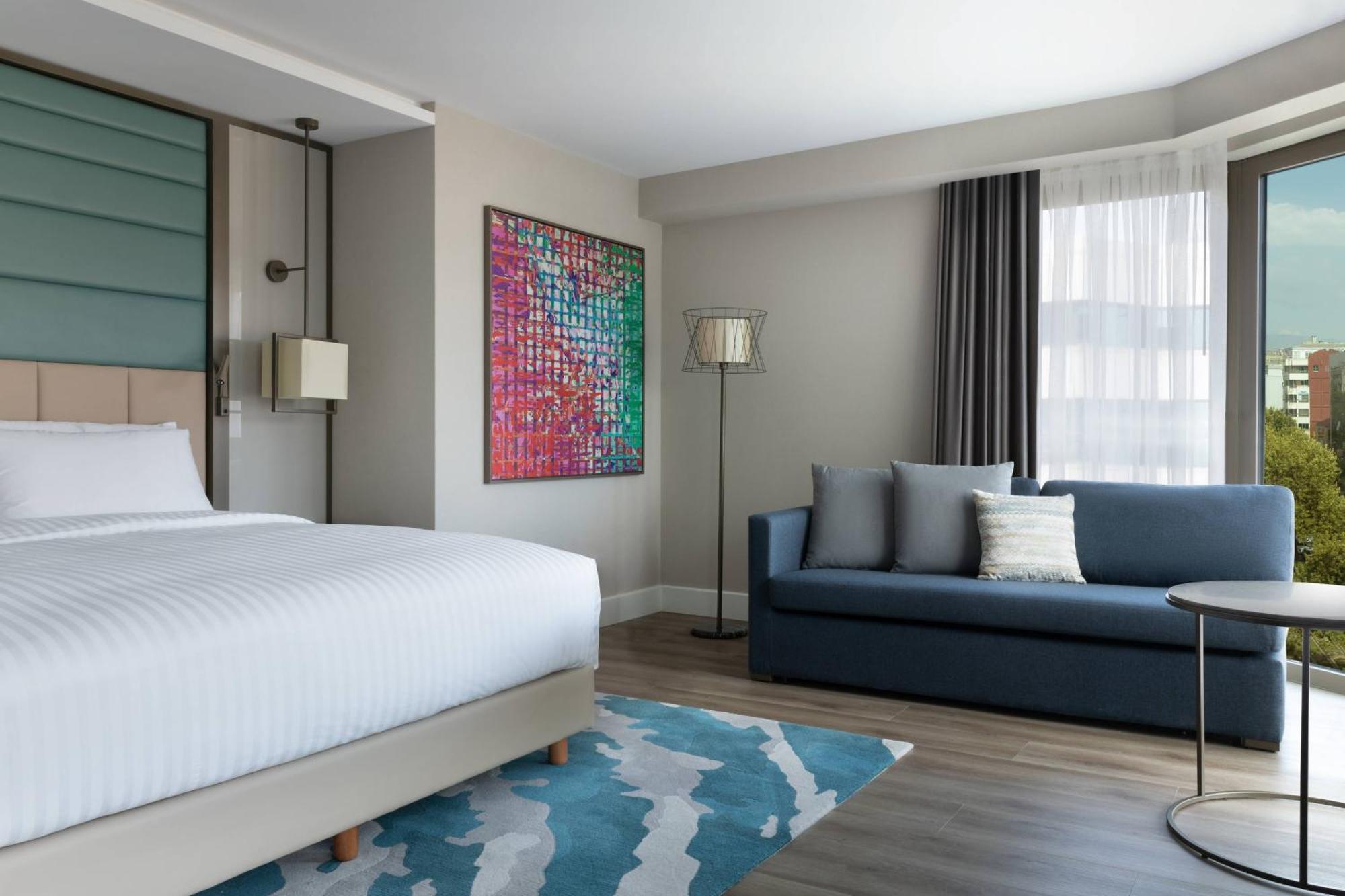 Hoekkamer met Kingsize Bed en Uitzicht op de Stad - Toegang tot de Executive Lounge