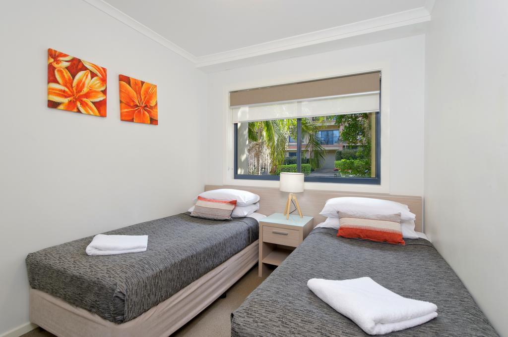 Three-Bedroom Apartment with Pool View